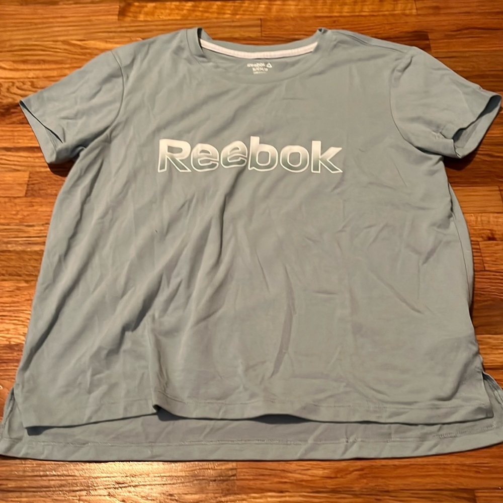 Reebok, size small, a green-blue color